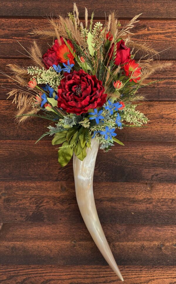 a cow horn flower arrangement