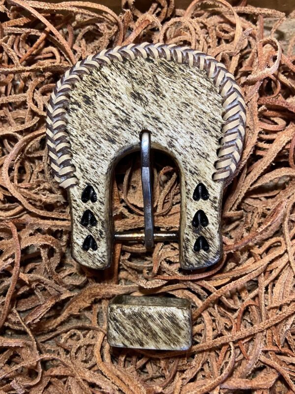 a Headstall Buckle with heart tracks and braid