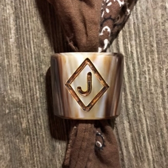 a scarf knot with copper inlay